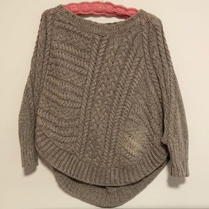 A comfortable grey sweater/poncho